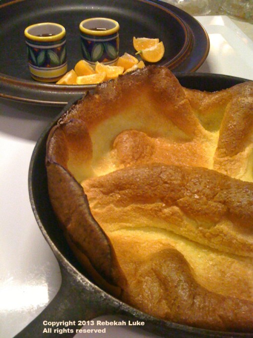 Out of the oven, the pancake has pulled away from the pan. Just loosen the sides with a knife and slip onto a serving plate.