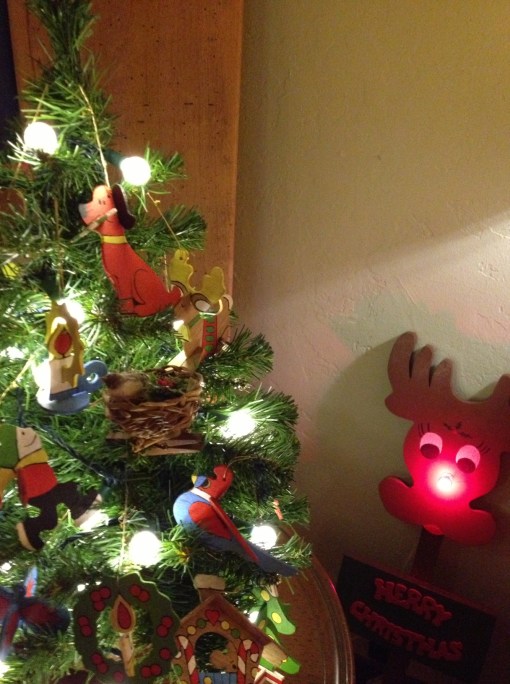 The wooden ornaments for the tree were made by Pete's parents for their granddaughter Ari. Dad made the big Rudolph with the shiny nose, too.